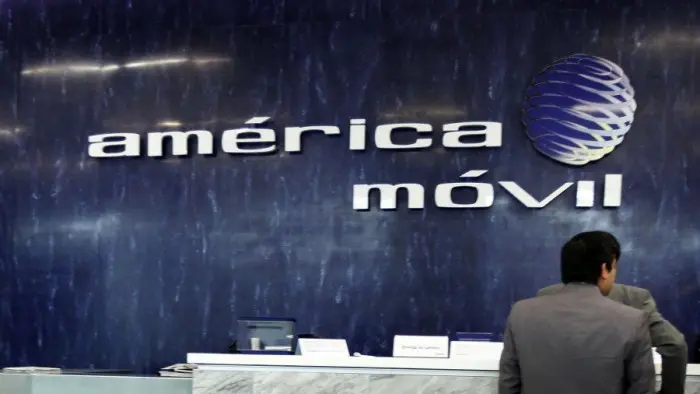 File photo of the logo of America Movil on the wall of the reception area in the company's corporate offices in Mexico City