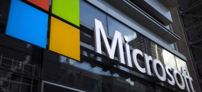 A Microsoft logo is seen on an office building in New York City, July 28, 2015. The global launch of the Microsoft Windows 10 operating system will take place on July 29. REUTERS/Mike Segar - RTX1M661